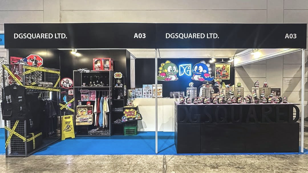 DG Squared Ltd. booth at a trade show with products on display.